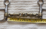 5.25" Hanging cheek snaffle, brass alloy waterford mouthpiece (1980)